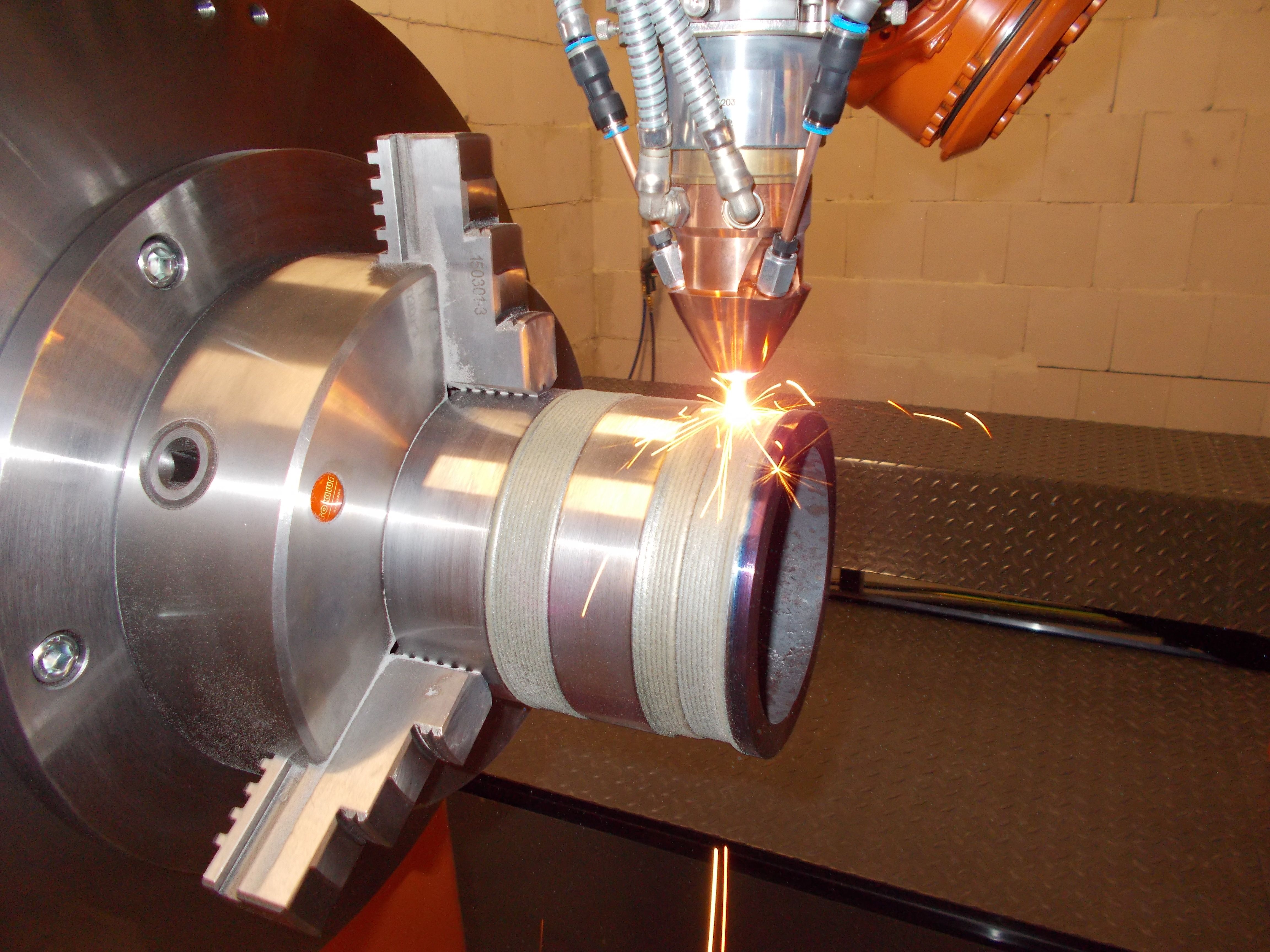 Laser cladding on a membrane wall with thermal laser spraying by Laserline diode lasers