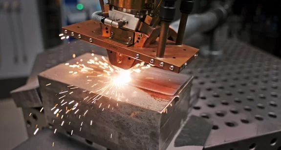 Laser cladding process with wide stream nozzle optic on a metal by Laserline diode lasers