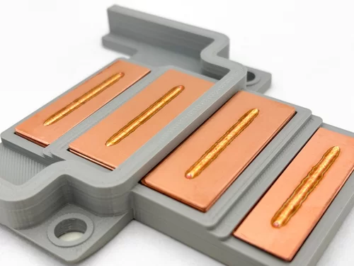 Weld-Seam-on-Copper.png A sample of copper plates with weld seams from the blue laser by Laserline diode lasers