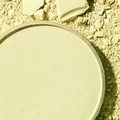 Sintered yellow ceramic circle surrounded by loose ceramic powder by Laserline diode lasers